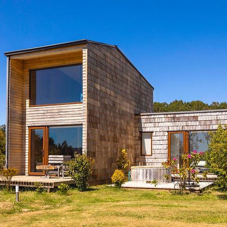 צ'ונצ'י Cabanas Arrayanes De Huillinco En Chiloe מראה חיצוני תמונה